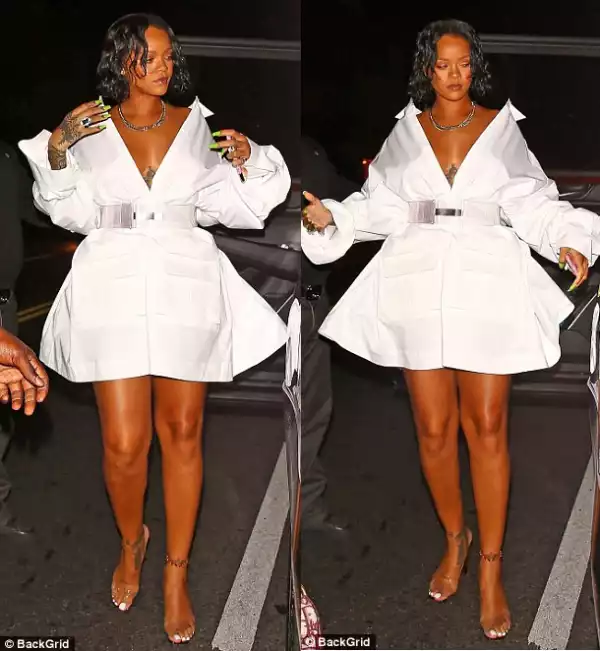 Rihanna flashes boobs as she steps out in gorgeous white dress